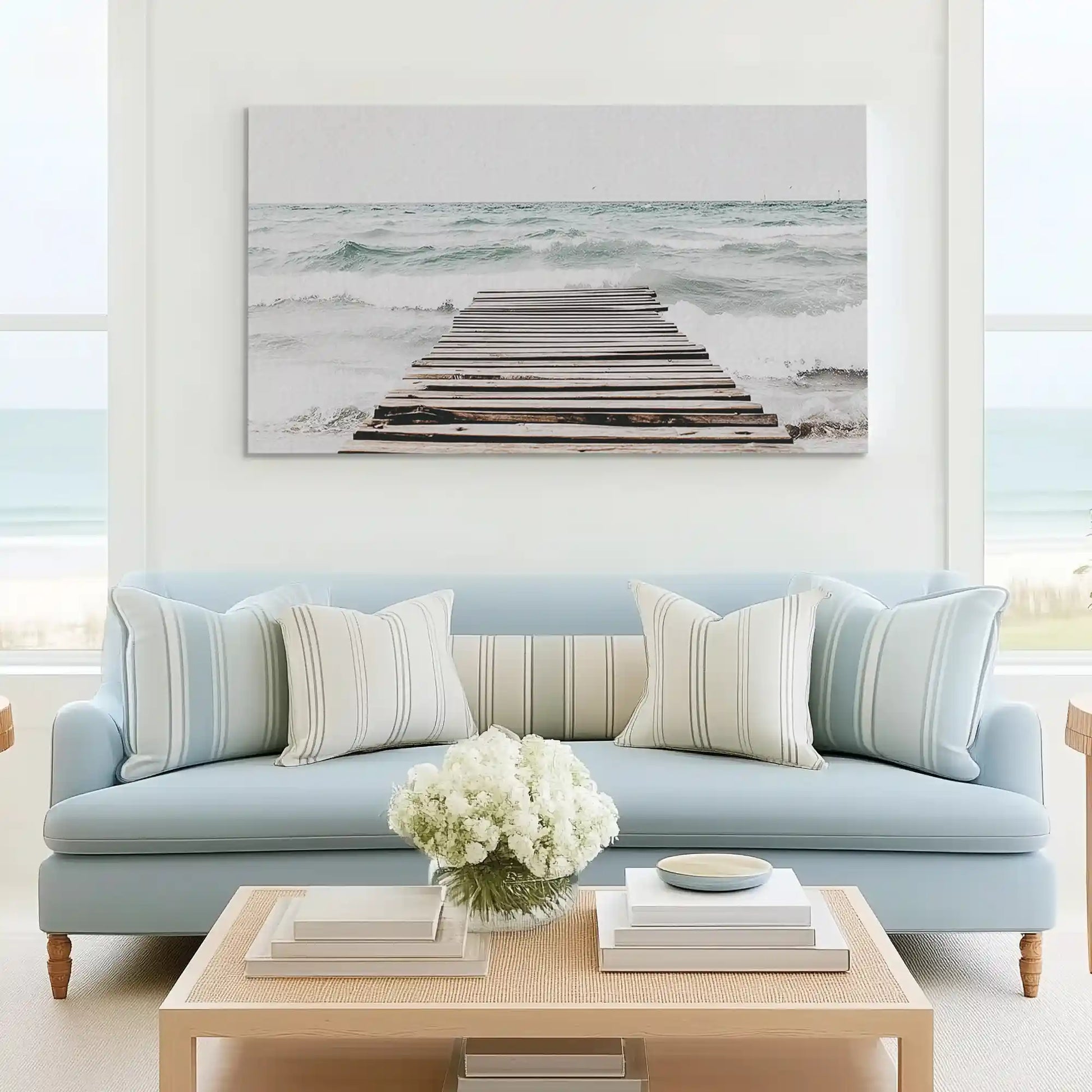 Tranquil dock and sea canvas art complementing minimalist living room decor