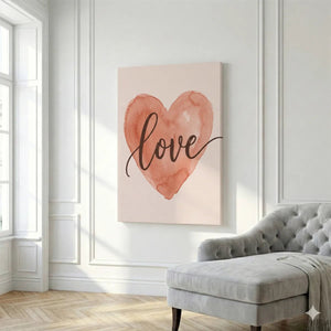 Minimalist canvas artwork depicting a gentle heart shape and the word 'love' in smooth cursive on a solid background.