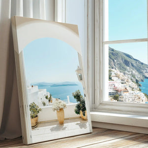 Ocean view through stone arch captured in a coastal canvas print with minimalist style