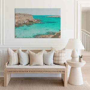 Large turquoise bay canvas print perfect for above sofa placement in airy rooms