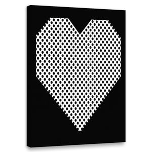 Canvas wall art featuring a bold geometric heart filled with black polka dots on a white field, centered on a solid black background