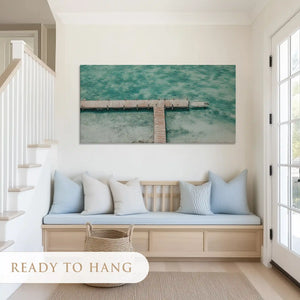 Textured ocean pier canvas art complementing light modern beach-inspired interiors
