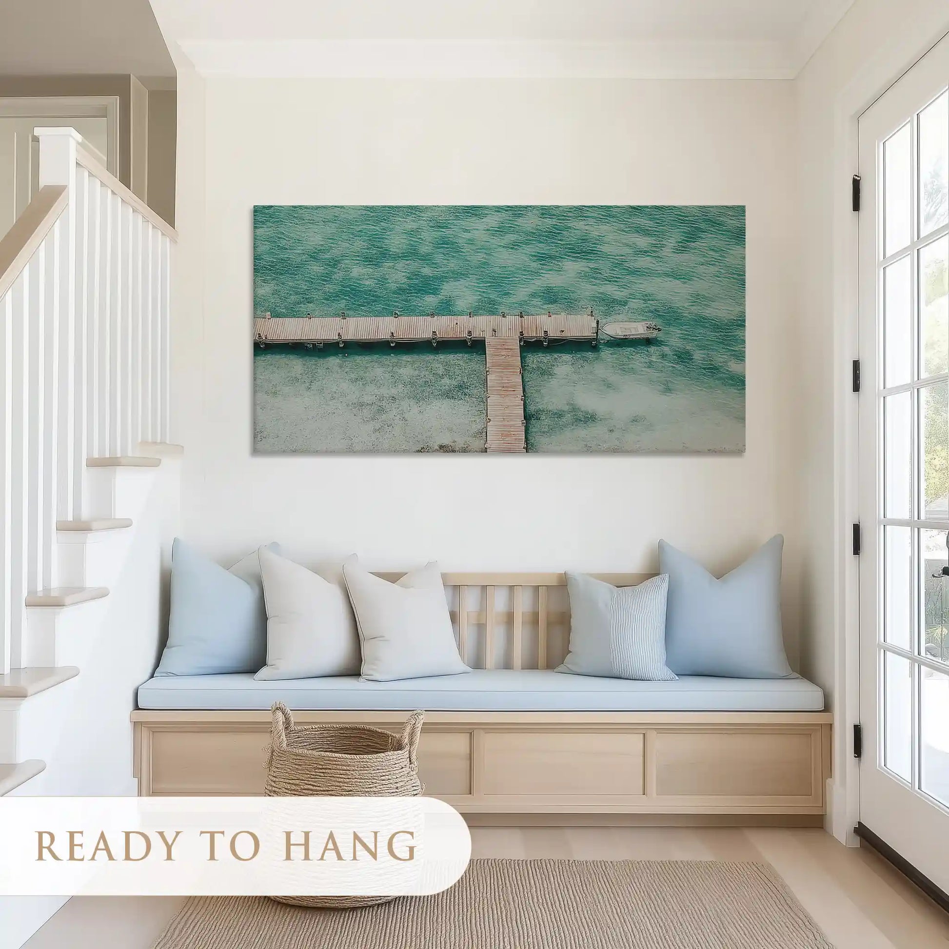 Textured ocean pier canvas art complementing light modern beach-inspired interiors