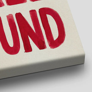 Vertical canvas art with bold red uppercase text and heart detail, designed in a modern, expressive style for bedroom walls.