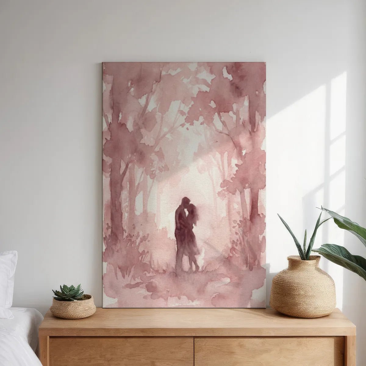 Canvas wall art print featuring a romantic embrace in a light-filled forest, with soft pink hues and delicate tree silhouettes.