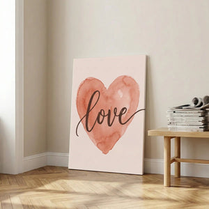 Vertical canvas art with a centered watercolor heart and flowing cursive 'love' text, styled for a modern nursery wall.