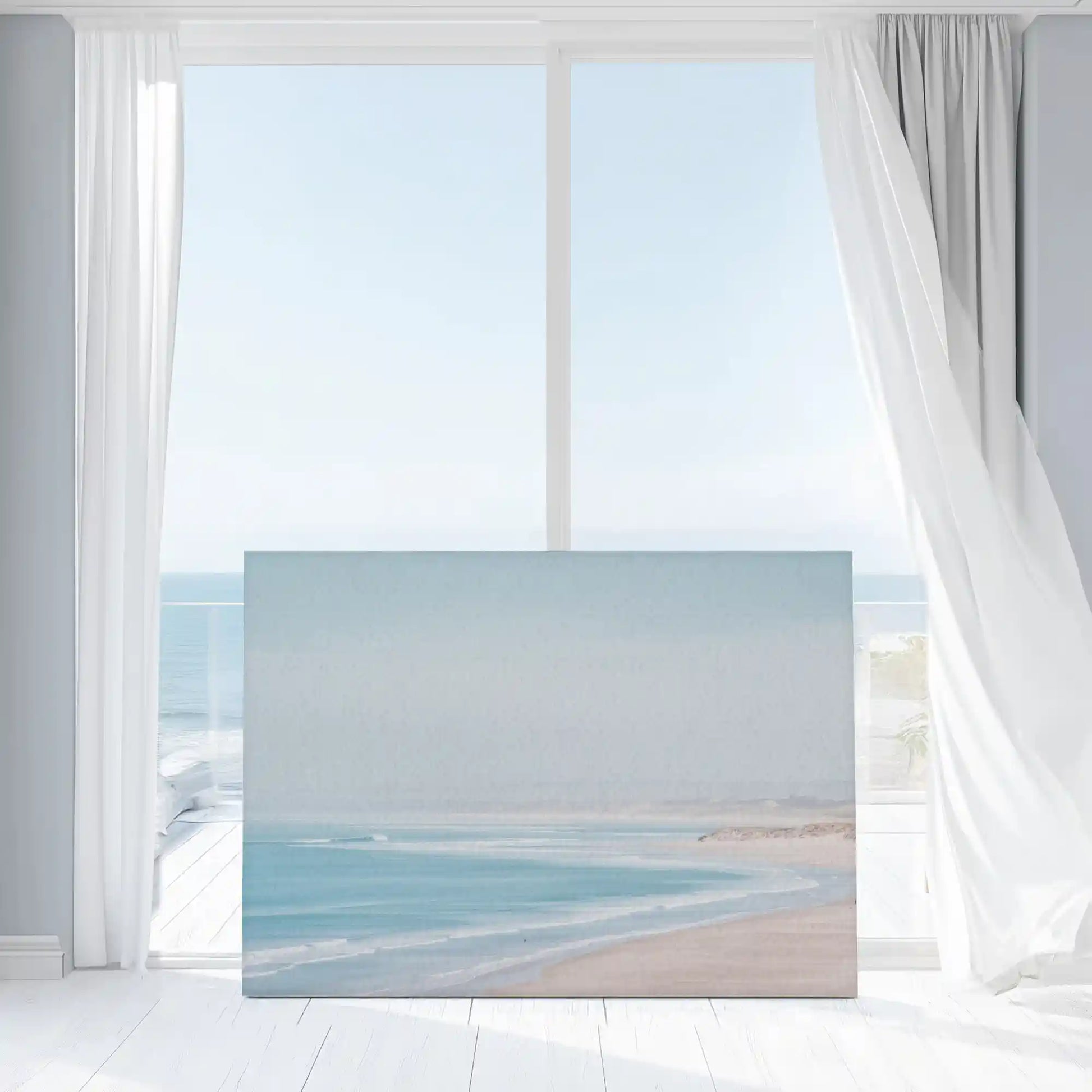 Soft blue ocean wall decor bringing airy and calming seaside mood to interiors
