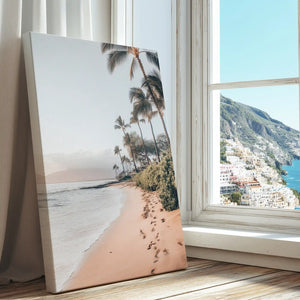 Footprints along sandy beach captured in a tropical canvas print with minimalist style
