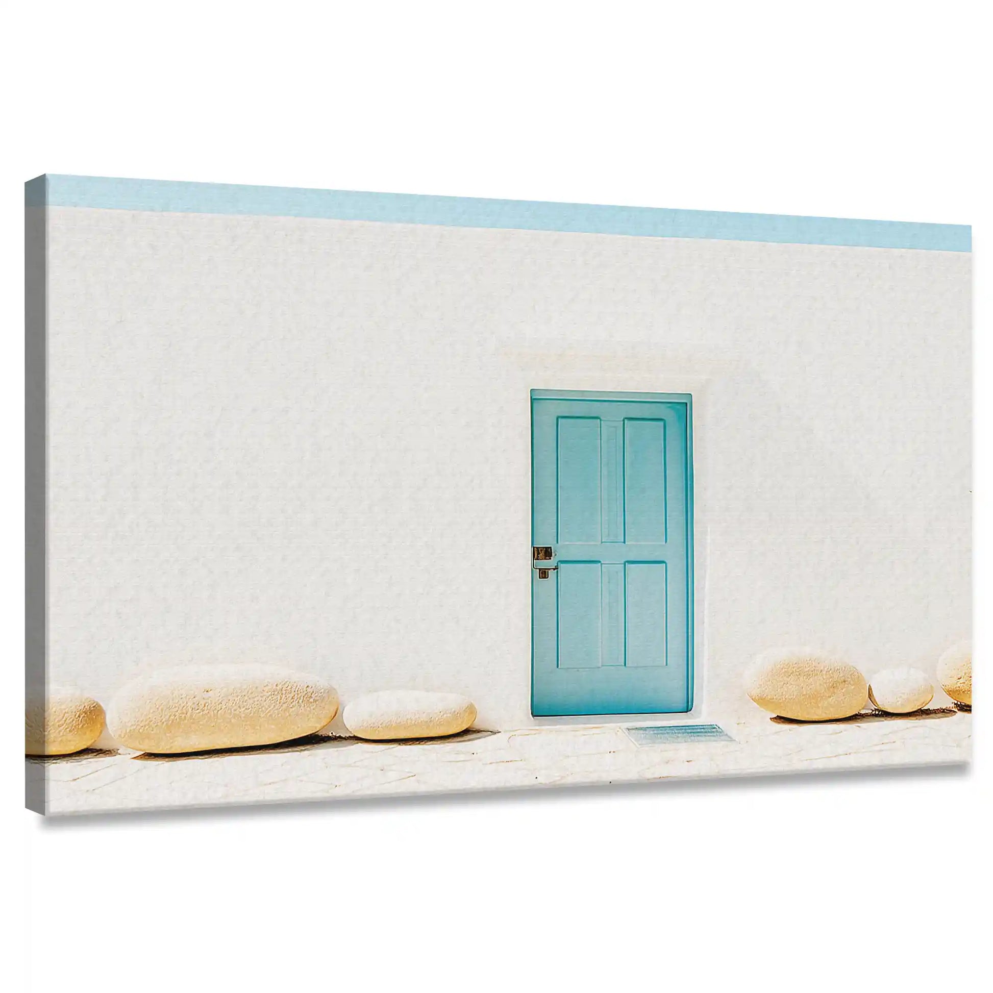 Coastal canvas wall art featuring a turquoise door and whitewashed wall with rustic stones