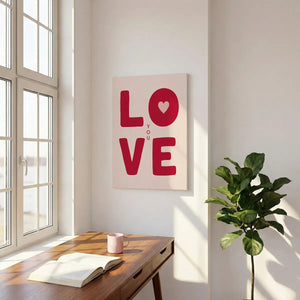 Bold and playful canvas wall art with stylized red LOVE typography and a heart symbol integrated into the letter O