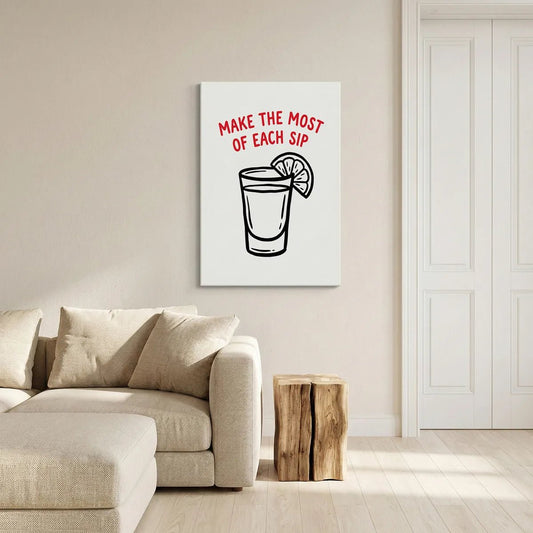 Playful canvas wall art with a centered shot glass illustration, citrus wedge on the rim, and curved red text above on a white background.