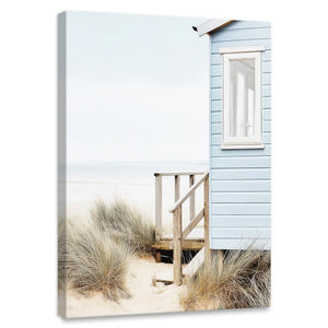 Coastal beach hut canvas wall art for bedroom featuring soft dune grass and pastel seaside backdrop