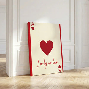 Decorative canvas print with a minimalist heart and card symbol composition, ideal for romantic-themed bedroom decor.