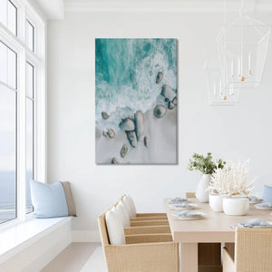 Peaceful aerial shoreline painting with rocks and waves, ideal for beach house or dining room