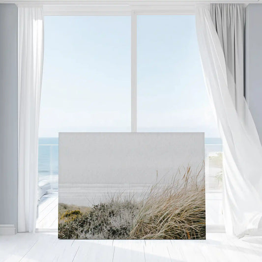 Neutral beach grass wall decor bringing calm and airy coastal mood to interiors