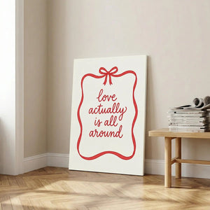 Modern canvas art combining clean lines and playful typography in a red-on-white romantic composition