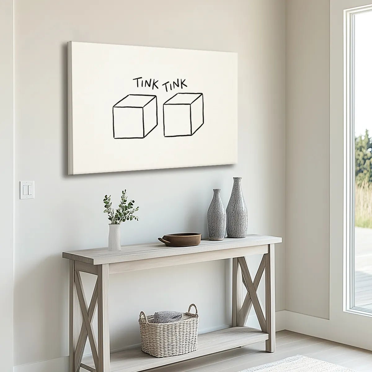 Black and white canvas wall art showing two geometric cubes beneath bold uppercase text in a clean layout