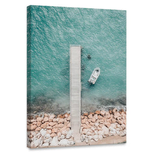Minimalist dock and boat canvas wall art for living room, featuring turquoise sea and pebble shore