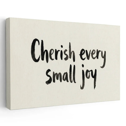 Canvas wall art featuring the handwritten quote 'Cherish every small joy' in bold black brush-style text on an off-white background