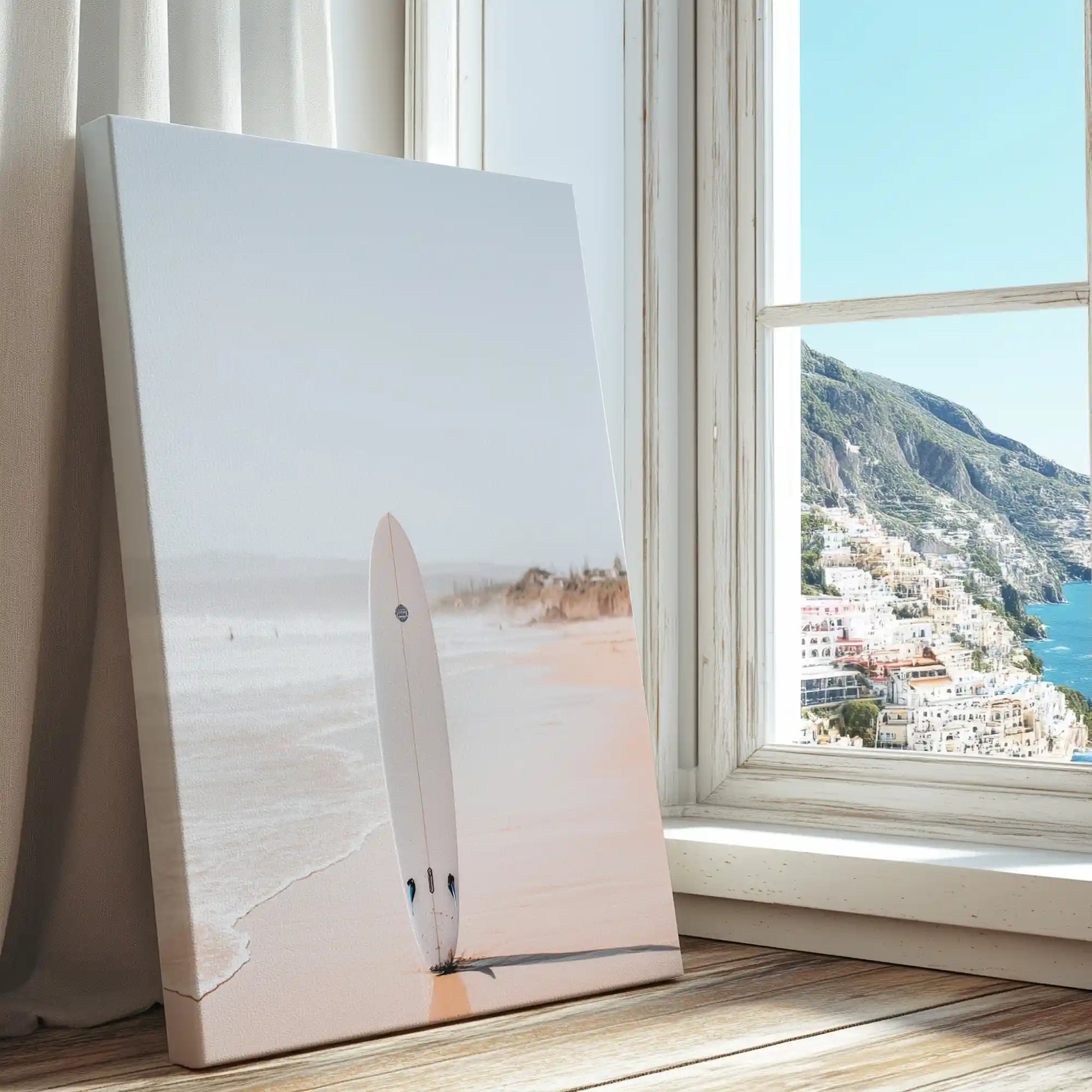 Single surfboard at shoreline captured in canvas print with clean style