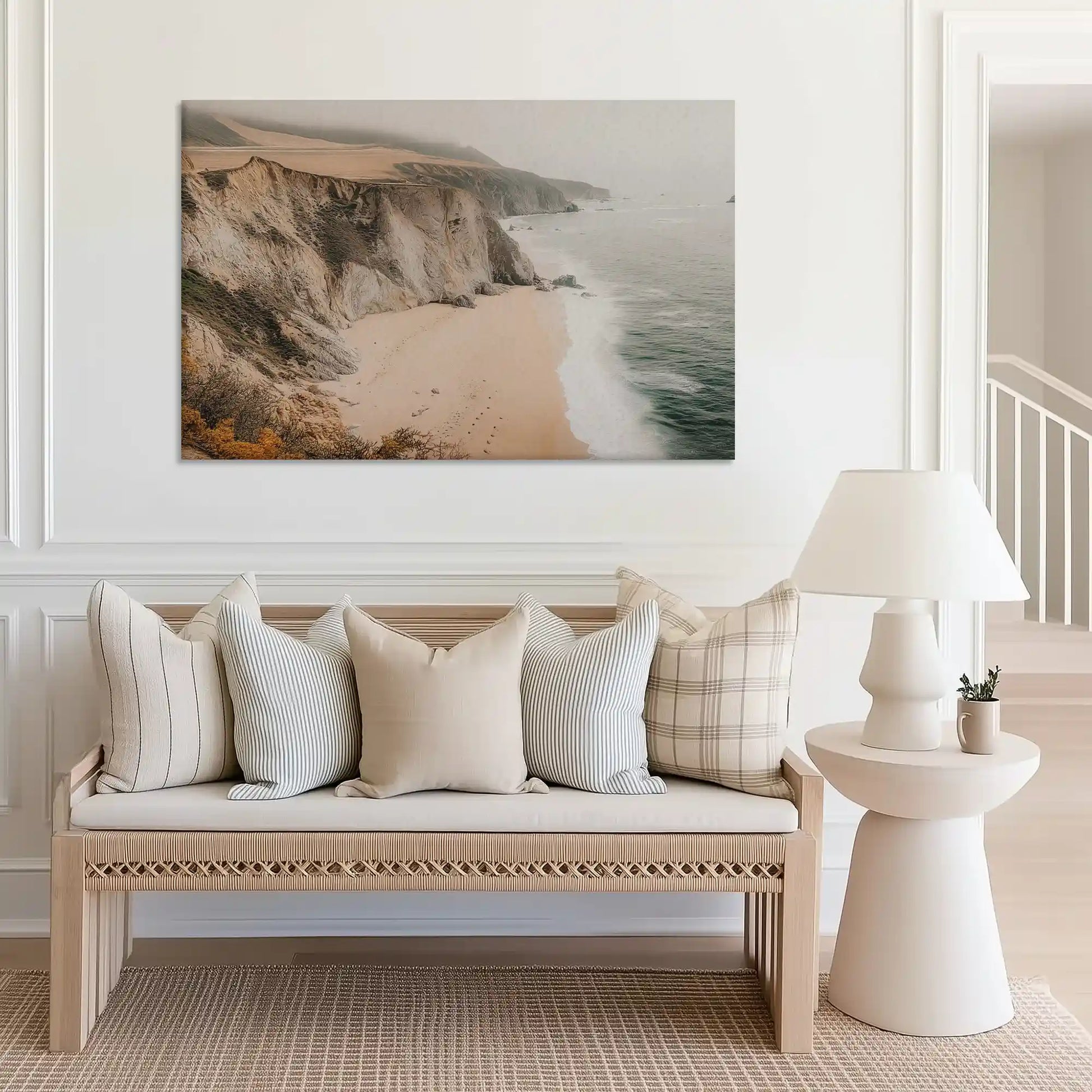 Large ocean cliff canvas art perfect for above sofa placement in light-filled coastal homes