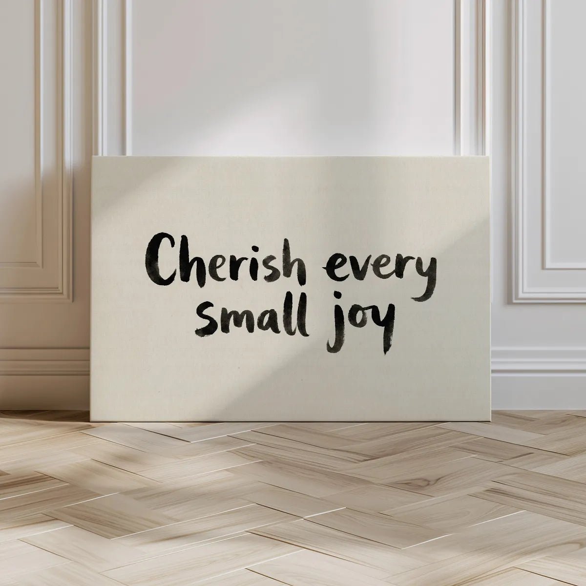 Canvas wall art in a horizontal layout featuring the phrase 'Cherish every small joy' in bold handwritten typography