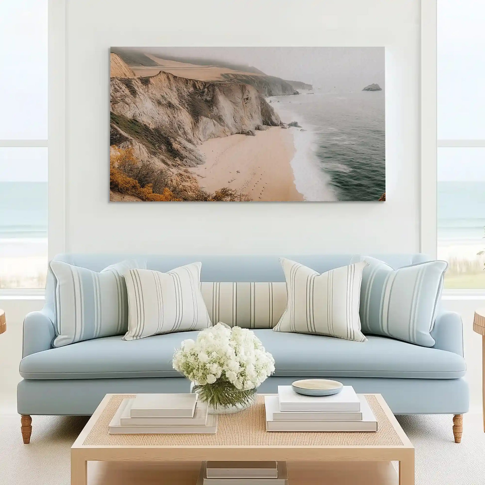Tranquil sandy beach painting complementing minimalist wall decor with rustic seaside charm
