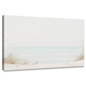 Coastal canvas wall art of soft dunes and sea grass overlooking turquoise ocean waters