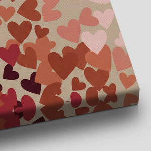 Modern canvas art with a graphic rendering of hearts in warm tones, evoking a lighthearted and affectionate mood