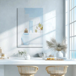 Neutral blue and white pottery wall decor adding airy feel to living space