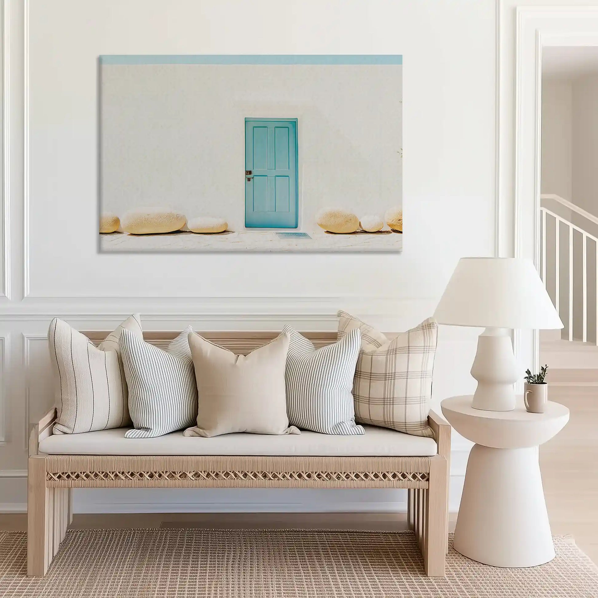 Large coastal canvas print of rustic seaside architecture with aqua door and soft tones