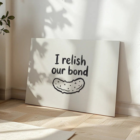 Minimalist canvas wall art with bold handwritten text and a cartoon-style pickle centered on a white background