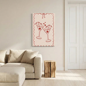 Cream and red canvas wall decor with flat illustrated drinks, heart cherries, and a centered bow above a scalloped frame.