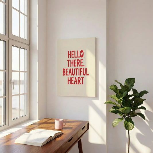 Clean and modern canvas wall art with centered red typography on an off-white background spelling 'HELLO THERE, BEAUTIFUL HEART'.