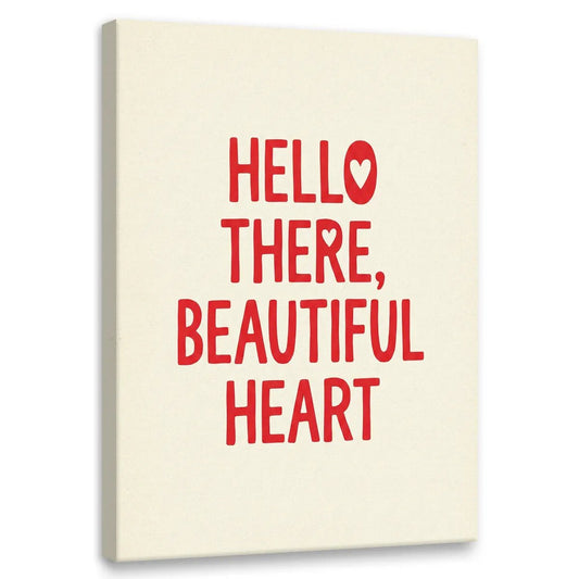 Minimalist canvas wall art featuring bold red text 'HELLO THERE, BEAUTIFUL HEART' with heart shapes in the letters 'O' and 'R'.