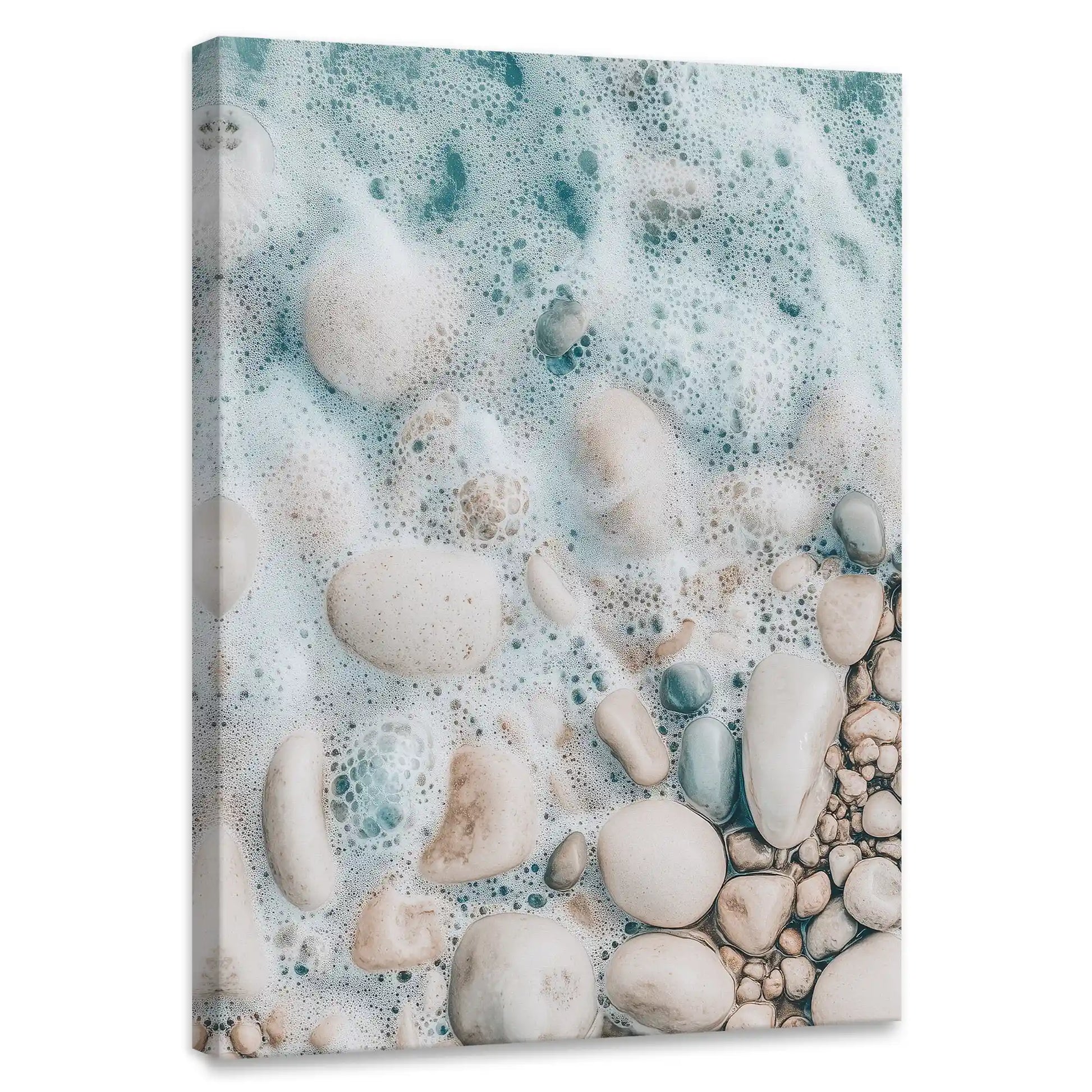 Aerial shoreline canvas wall art for bedroom featuring foamy turquoise waves over smooth pebbles