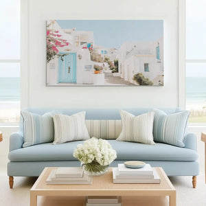 Large seaside village canvas print perfect for above sofa placement in bright rooms