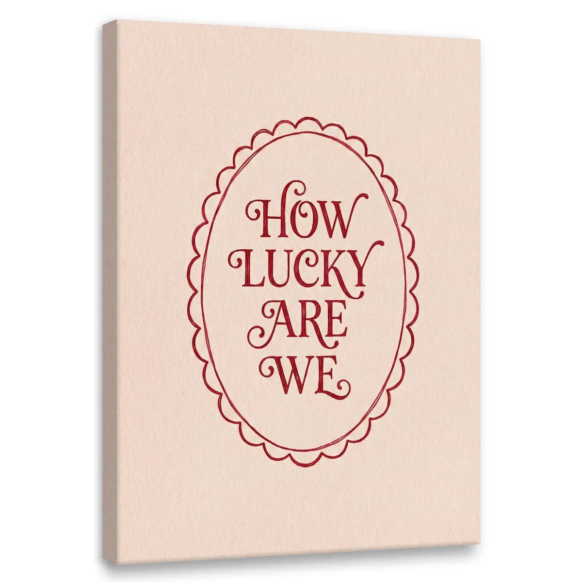 Minimalist canvas wall art featuring red text 'HOW LUCKY ARE WE' centered inside a scalloped oval on a beige background