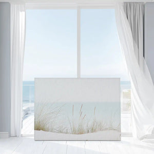 Light neutral shoreline wall decor bringing airy and calming mood to interiors