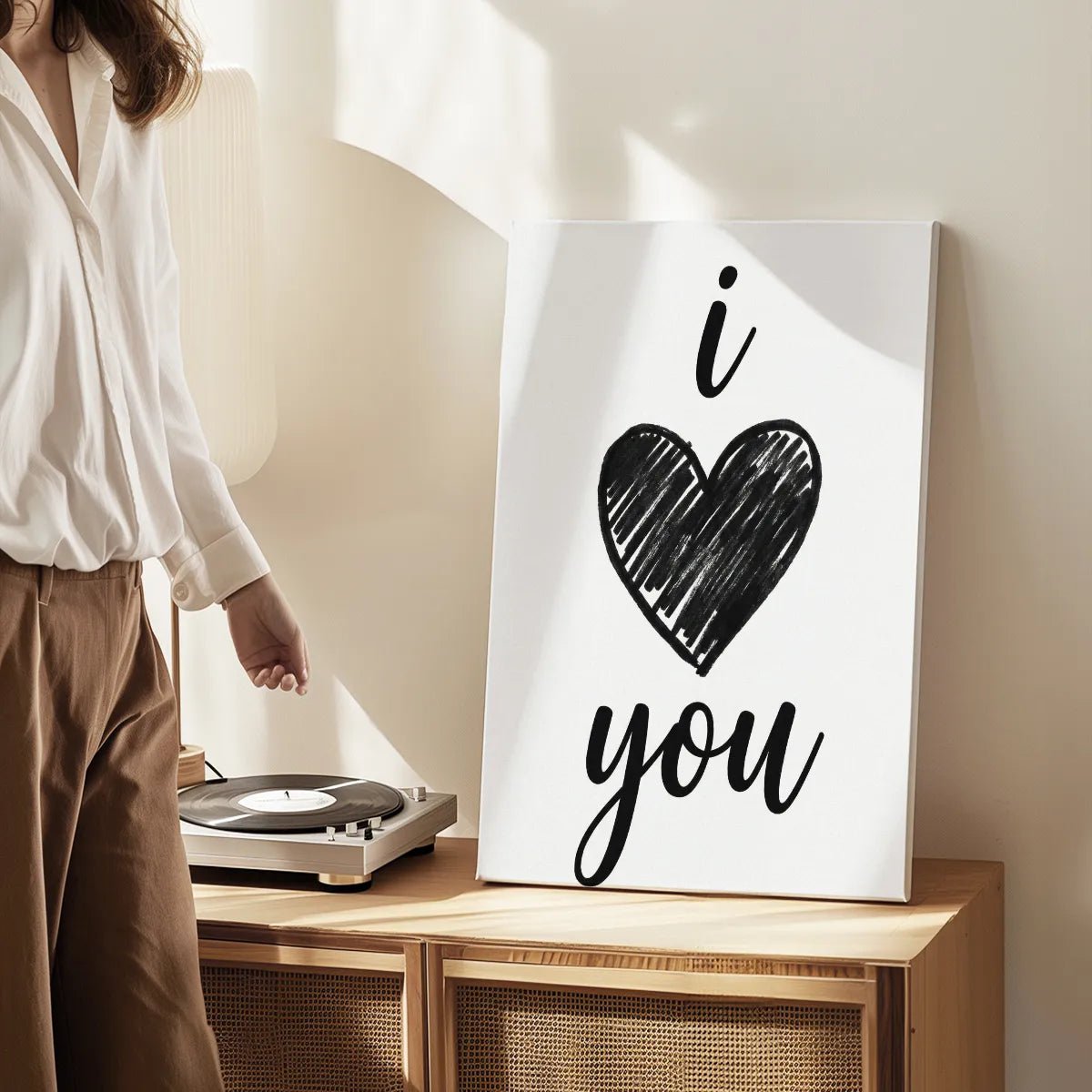 Canvas wall art print featuring a bold sketchy heart and simple handwritten text, perfect for romantic minimalist settings