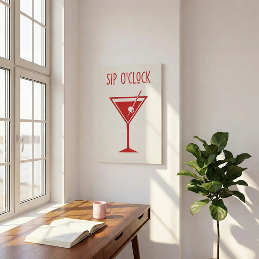Bold canvas wall art showing a graphic red cocktail glass and playful 'SIP O'CLOCK' text on a white background.