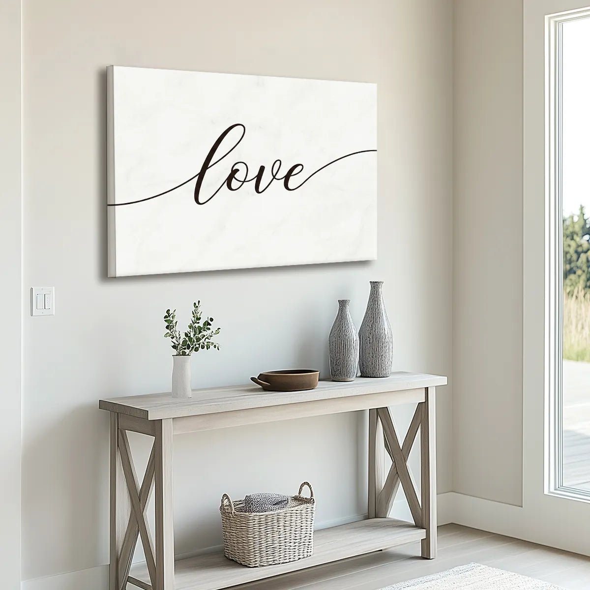Typography canvas print displaying the word 'love' in smooth script, set against a monochrome background.