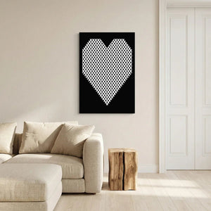 Canvas print showing a centered geometric heart in monochrome tones, rendered in a clean, graphic style