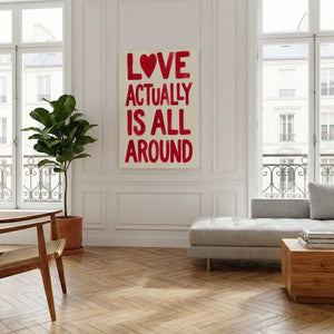 Decorative canvas print with playful red lettering and centered composition, conveying a loving message in a bold style.