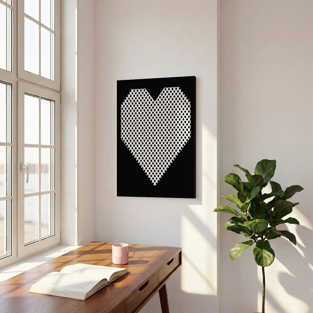 Minimalist canvas wall decor with a symmetrical heart shape filled with evenly spaced black dots against a black backdrop