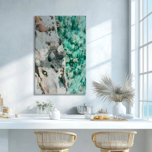 Emerald ocean and rocky shoreline canvas print adding vibrant coastal tones to wall decor