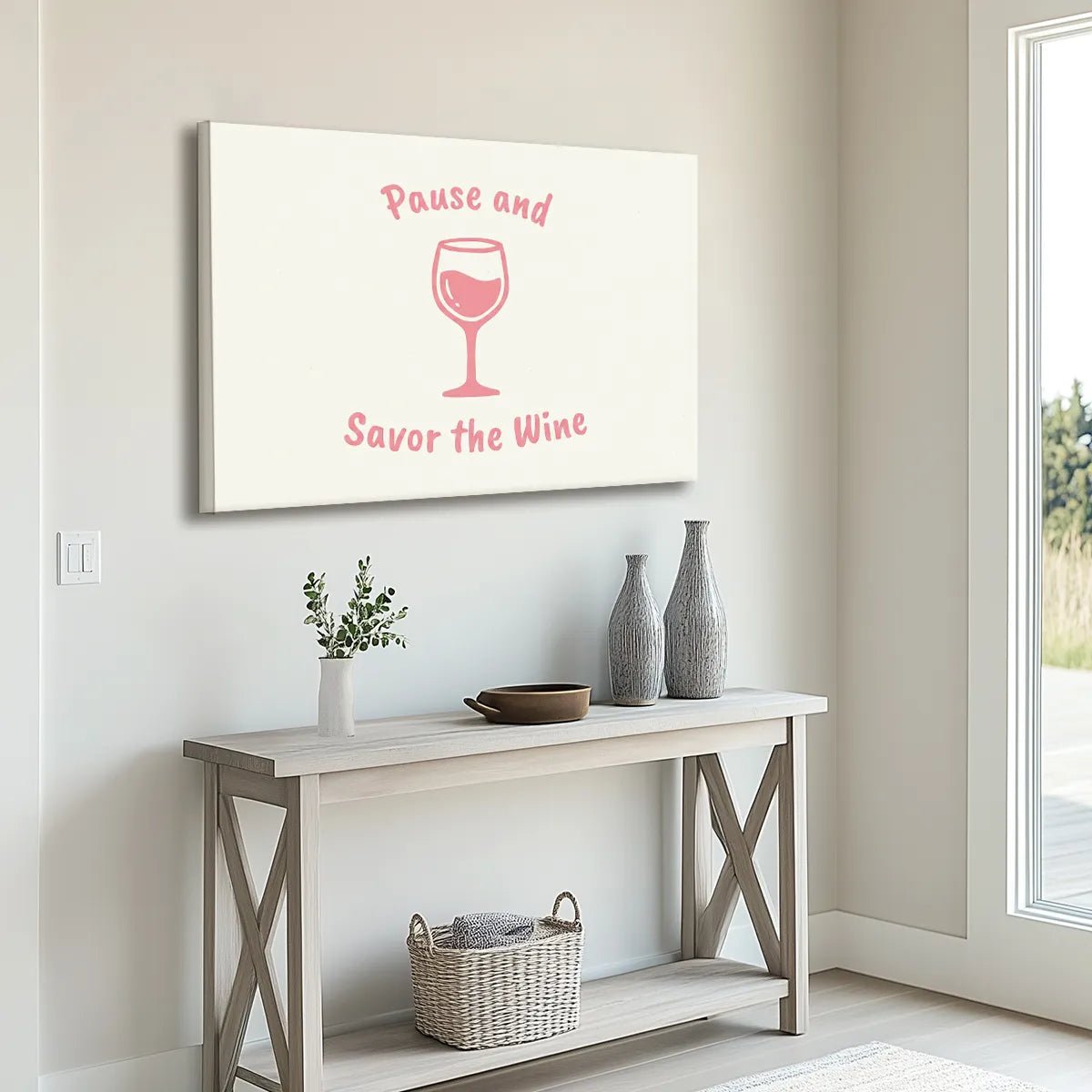 Canvas wall art showing a pink wine glass and quote in a flat, graphic style with smooth line quality.