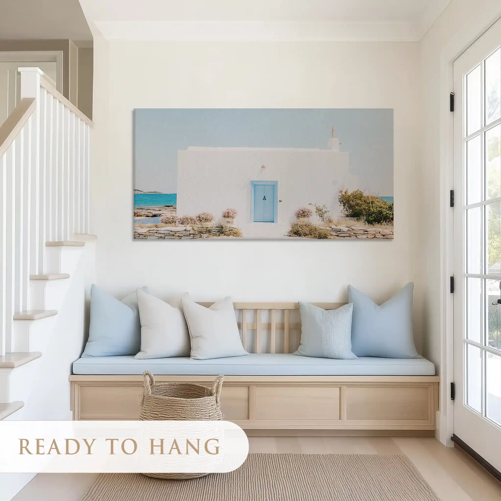 Tranquil painting of blue door and seaside hues creating a serene focal point