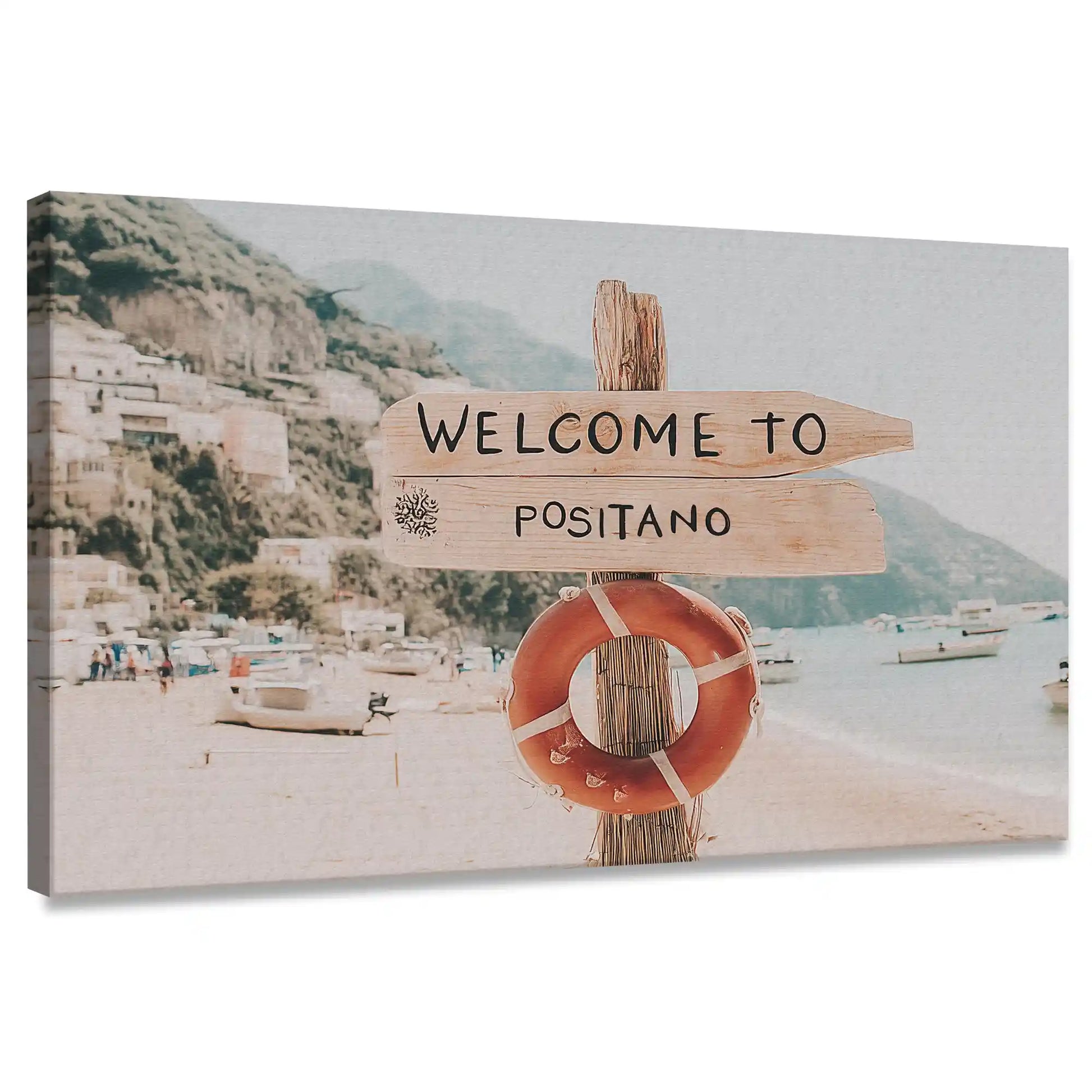 Coastal canvas wall art featuring a “Welcome to Positano” sign with seaside village backdrop
