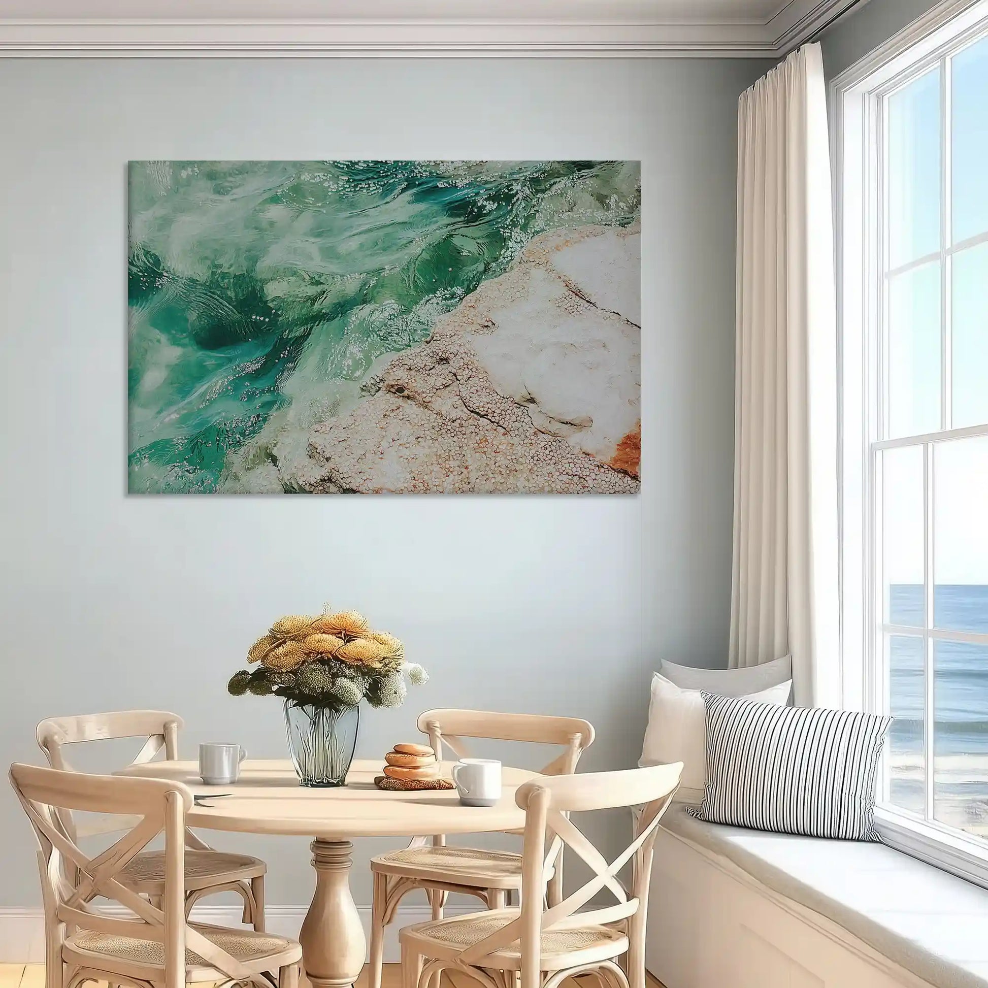 Neutral sand and emerald water canvas art enhancing light-filled bedroom wall design